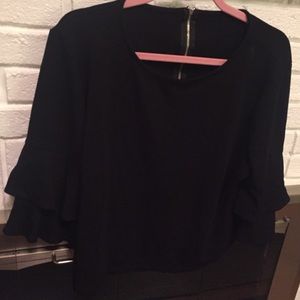 Top with bell sleeves